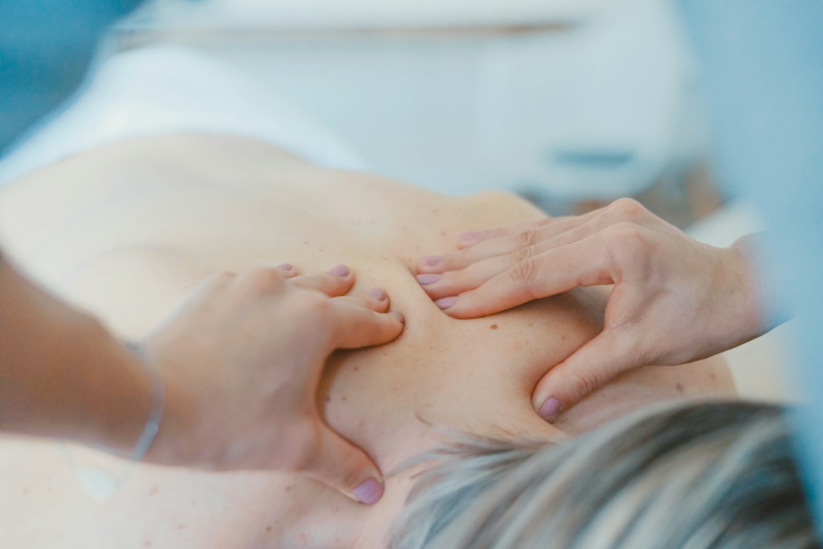 Hands-on therapeutic treatment during a wellness session